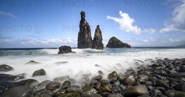 Long exposure, beach with volcanic rock, rock formation Ilheus da Rib and Ilheu da Ruama in the sea, Praia da Ribeira da Janela, Madeira, Portugal, Europe