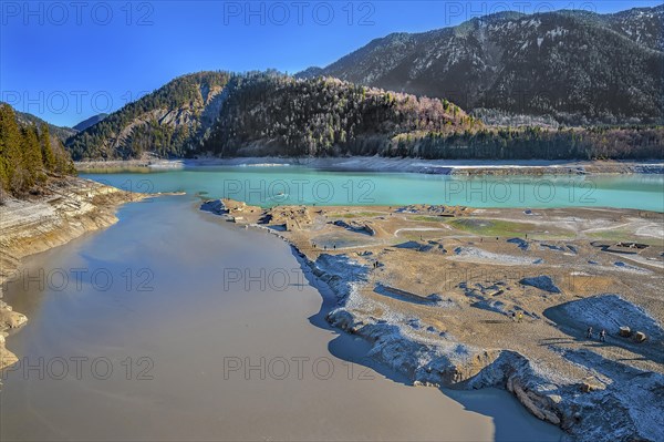 Sylvenstein reservoir, partially drained with foundation walls of old buildings, Bavaria, Germany, Europe