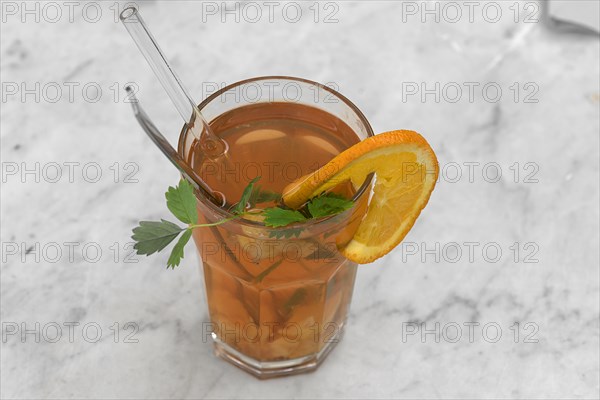 Quince juice in a glass with a straw, Bavaria, Germany, Europe