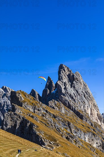 Paragliding flight over the Geisler Group, Val Gardena, Dolomites, South Tyrol, Italy, Europe