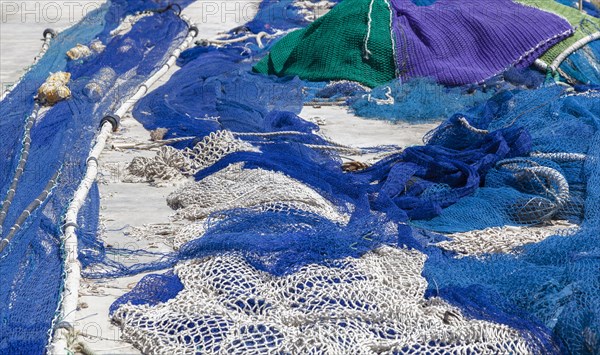 Colourful fishing nets and ropes laid out to dry, Port de Soller harbour, Majorca, Balearic Islands, Spain, Europe