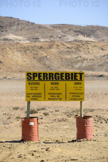 Warning sign at the diamond exclusion zone in the Sperrgebiet National Park, also Tsau ÇKhaeb National Park, Namibia, Africa