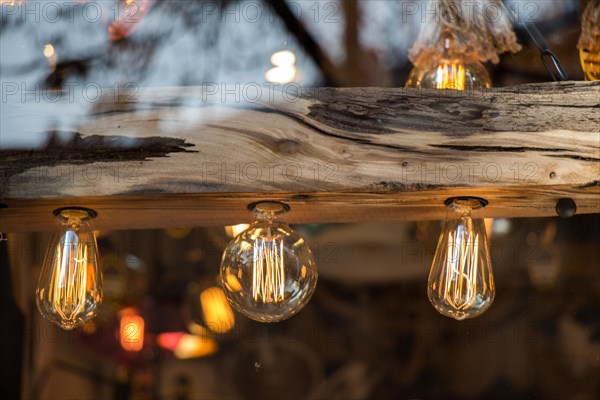 Decorative antique edison style filament light bulbs hanging