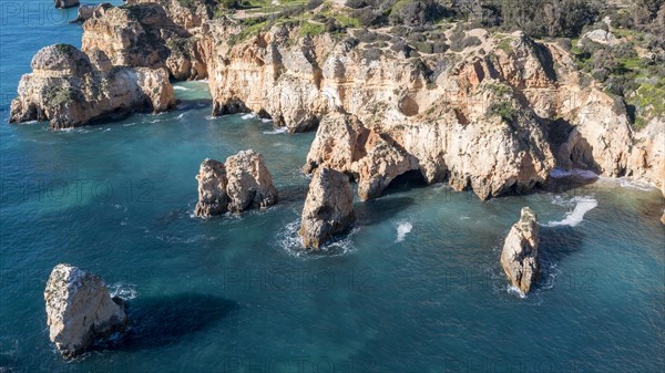 Praia da Marinha, rocks and cliffs, steep coast in the Algarve, Portugal, Europe