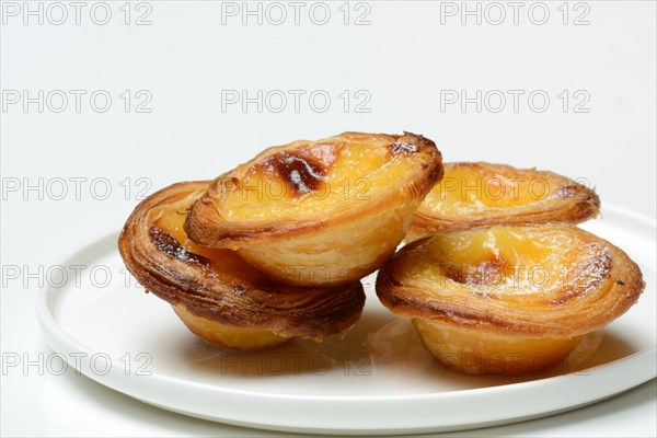 Pastel de Nata, Pasteis de Nata on a plate, custard tart, Portuguese speciality