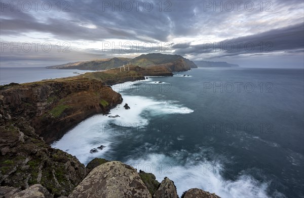 View of the island, cliff with red cliffs and sea at sunset, long exposure, Baixas do Guincho, volcanic peninsula Sao Lourenco, Ponta de San Lorenzo, Madeira, Portugal, Europe