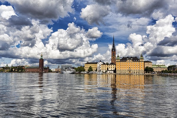 View over the Riddarfjaerden to the city hall and the church Riddarholmskyrkan, skyline of the old town, Stockholm, Maelaren, Sweden, Europe