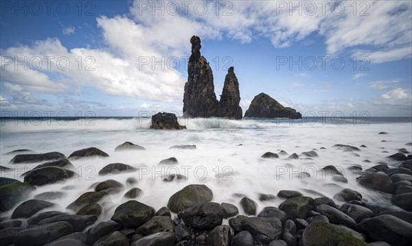 Long exposure, beach with volcanic rock, rock formation Ilheus da Rib and Ilheu da Ruama in the sea, Praia da Ribeira da Janela, Madeira, Portugal, Europe