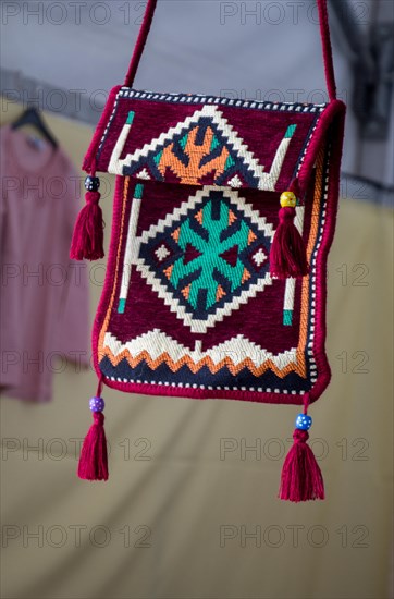 Traditional style handmade woven bags made of fabric