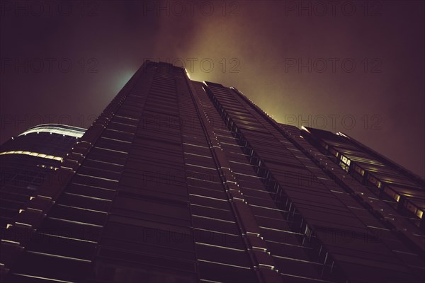 Contemporary skyscraper at rainy night