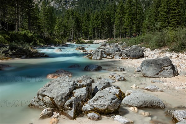 Rapid river flowing through the valley in the Italian Dolomites, Dolomites, Italy, Europe