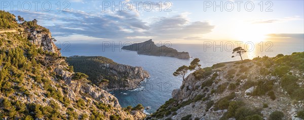 Rocky coast with an island, Sunset over the ocean, Mirador Jose Sastre, Sa Dragenora Island, Mallorca, Spain, Europe