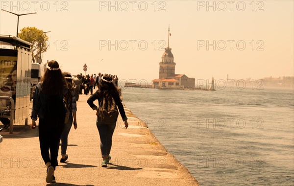 People towards Maidens Tower located in the middle of Bosporus