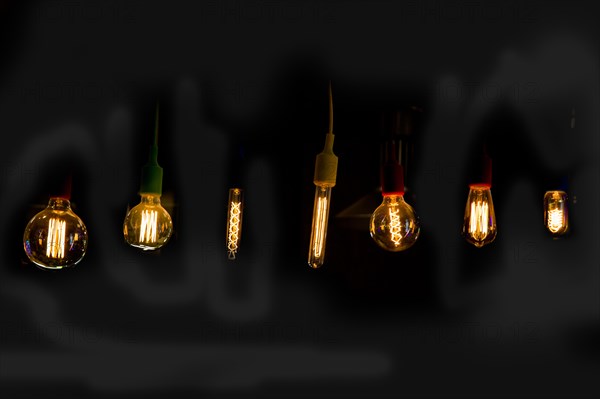 Decorative antique edison style filament light bulbs hanging