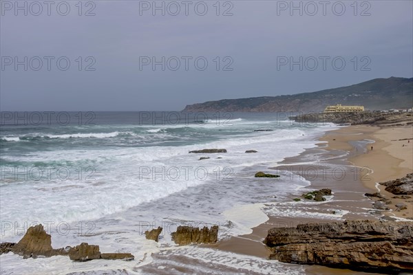 Praia da Cresmina, in the background Fortaleza do Guincho, today a 5 star hotel, near Cascais Portugal