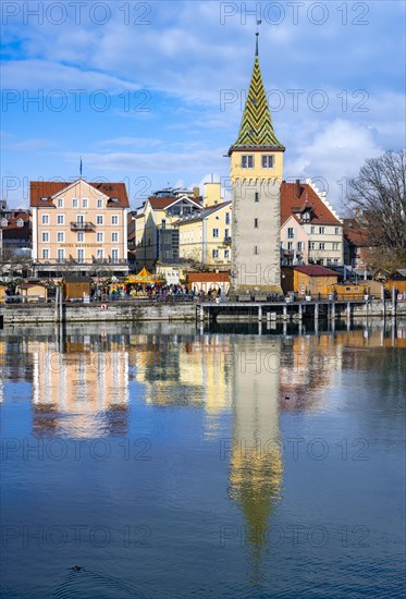 Harbour promenade with Mangturm, reflected in the lake, harbour, Lindau Island, Lake Constance, Bavaria, Germany, Europe