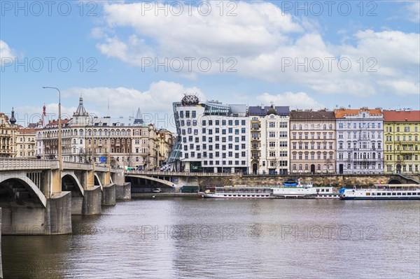 View of the Dancing House iand otrher colorful buildings located in Prague, Czech Republic, Europe