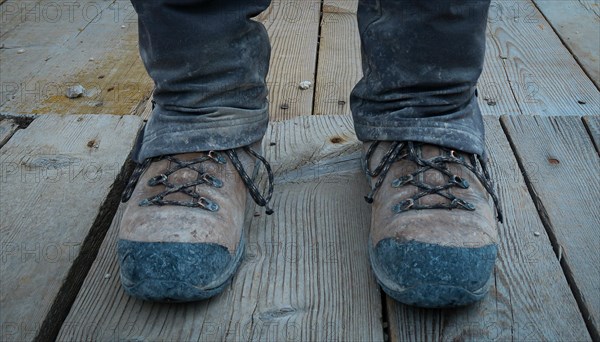 Dirty trekking shoes on the mountain trail. Dolomites, Italy, Dolomites, Italy, Europe