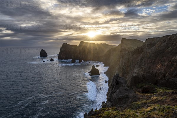 Red cliffs and rocks in the sea, coastal landscape, at sunrise, Miradouro do Canical, Ponta de Sao Lourenco, volcanic peninsula of Sao Lourenco, Ponta de San Lorenzo, Madeira, Portugal, Europe