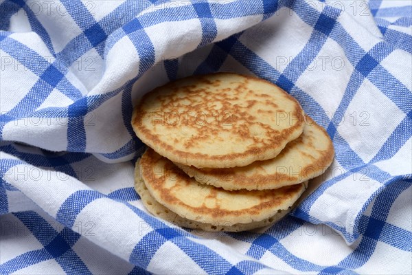 Blini, blinis on kitchen towel, mini pancakes