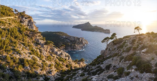 Rocky coast with an island, Sunset over the ocean, Mirador Jose Sastre, Sa Dragenora Island, Mallorca, Spain, Europe