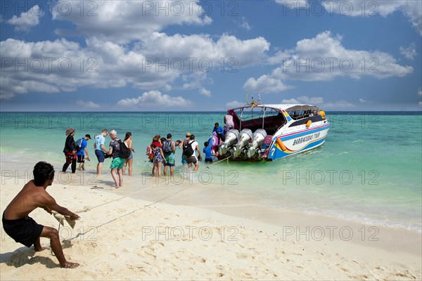 Tourists return to Krabi by moto boat after a day trip from Ko Poda Beach, Thailand, Asia