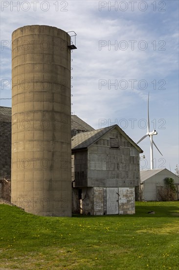 Pigeon, Michigan, A wind turbine, part of the Harvest II Wind Project, near a barn in the Thumb of Michigan