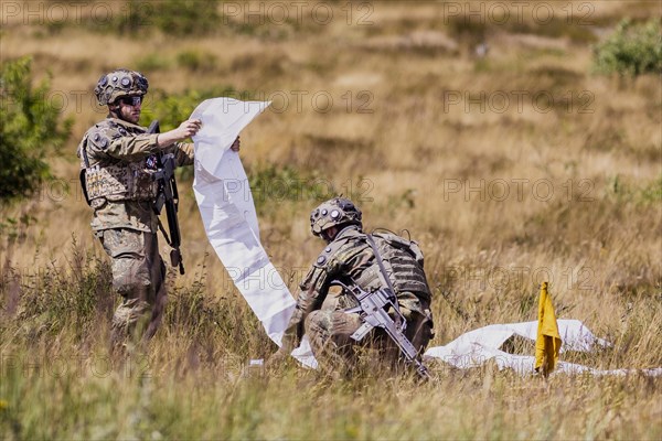 Soldiers of the Jaegerbataillon 292 train a combat situation at the Bundeswehr Combat Training Centre in Letzling The soldiers wear AGDUS equipment