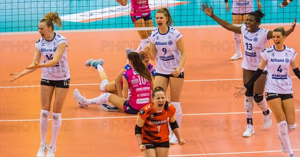 Allianz MTV Stuttgart players cheer after winning a point