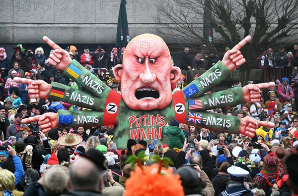 Theme float by Jaques Tilly: Putins war of aggression in Ukraine, Rosenmontagszug in Duesseldorf, North Rhine-Westphalia