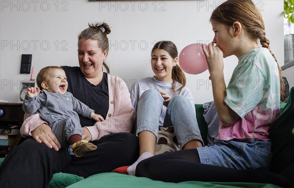Woman with three daughters, Bonn, Germany, Europe