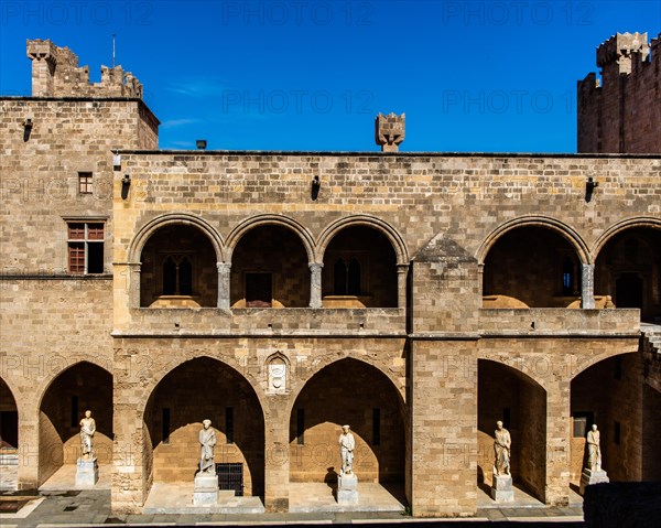 Inner courtyard surrounded by arcades with statues from Hellenistic and Roman times, Grand Masters Palace built in the 14th century by the Johnnite Order, fortress and palace for the Grand Master, UNESCO World Heritage Site, Old Town, Rhodes Town, Greece, Europe