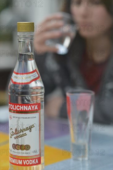 An 11-year-old girl stands as a model. Symbol photo alcoholism, Germany, Europe