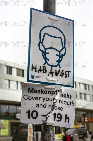 Mandatory masks in the area of Bilk station, signs are often destroyed or painted, Duesseldorf, North Rhine-Westphalia, Germany, Europe