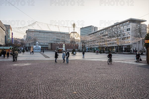 Kennedyplatz at pre-Christmas time in Essen during the coronavirus pandemic, only a few stalls of this years mini Christmas market, Essen, North Rhine-Westphalia, Germany, Europe