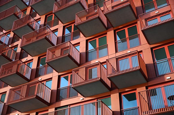 Orange facade with balconies, NDSM Plein, Amsterdam, Netherlands