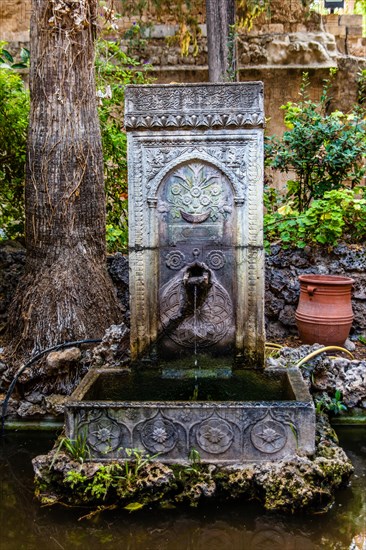 Fountain, Garden courtyards, Archaeological Museum in the former Order Hospital of the Knights of St John, 15th century, Old Town, Rhodes Town, Greece, Europe