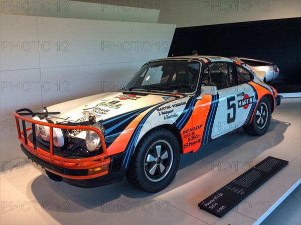 Off-road high-slung Porsche 911 SC Rallye with more ground clearance in Martini Racing Design, Porsche Museum, Stuttgart, Baden-Wuerttemberg, Germany, Europe