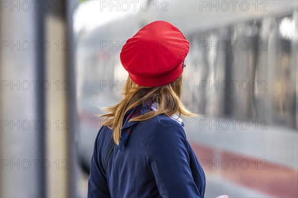 Train supervisor, Deutsche Bahn employee with red cap, Stuttgart main station, Baden-Wuerttemberg, Germany, Europe