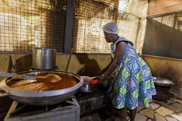 Topic: School feeding in Africa. Cereals and gravy are ready for school meals., Krokrobite, Ghana, Africa