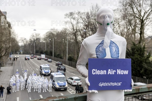 Protest of the environmental organisation Greenpeace, on the Bundesstrasse 14 40 activists demand better air quality, the Neckartor is considered the most polluted street in Germany with high levels of particulate matter, climate change, Stuttgart Baden-Wuerttemberg, Germany, Europe