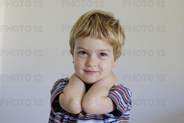 Bonn. Toddler shows his feelings, here the feeling of self-confidence. Bonn, Germany, Europe