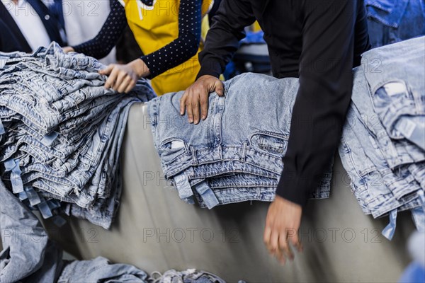 A worker sorts jeans at the Afrasyab jeans factory in Samarkand, 02.11.2022., Samarkand, Uzbekistan, Asia