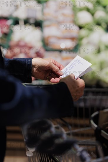 Shopping list in the supermarket., Radevormwald, Germany, Europe