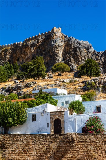 Ancient theatre from the 4th century with over 25 rows of seats for 2000 visitors, Lindos, Rhodes, Greece, Europe