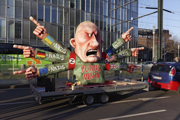 Stop Putin, Demonstration against the Ukraine war on 25.2.23., Mottowagen Karneval with Putin figure by Jacques Tilly, Duesseldorf, North Rhine-Westphalia, Germany, Europe