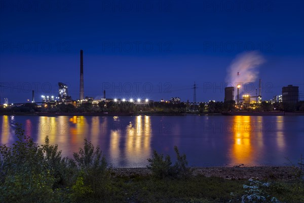 Huettenwerke Krupp Mannesmann, HKM, steam cloud coking plant, gas flare, Rhine, night shot, Duisburg, North Rhine-Westphalia, North Rhine-Westphalia, Germany, Europe