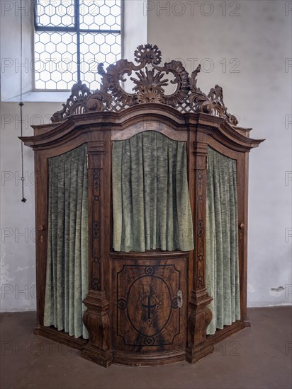 Confessional in the Catholic parish church of St. Peter and Paul, former collegiate church, Romanesque columned basilica, Unesco World Heritage Site, Niederzell on the island of Reichenau in Lake Constance, Constance district, Baden-Wuerttemberg, Germany, Europe