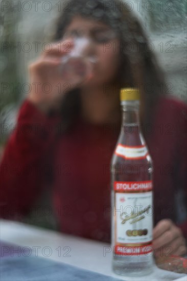 An 11-year-old girl stands as a model. Symbol photo alcoholism, Germany, Europe