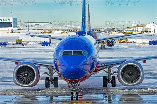 Denver, Colorado, Southwest Airlines jets on the ground after a snowstorm at Denver International Airport